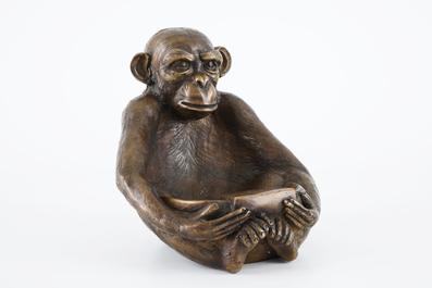 A bronze sculpture of a monkey holding a tray, 20th C.