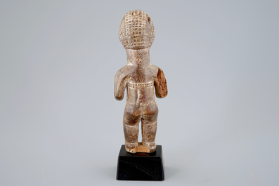 An African carved wood figure, Bembe, Congo, 19/20th C.