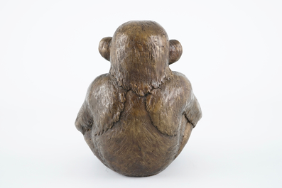 A bronze sculpture of a monkey holding a tray, 20th C.