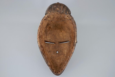 An African carved wooden mask, Lwalwa, Congo, mid 20th C.
