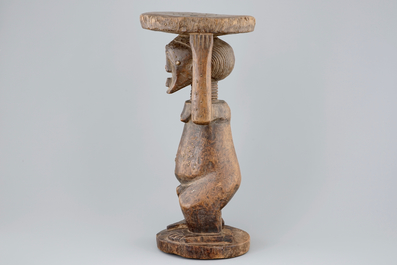 An African carved wood stool, Songye, Congo, 1st half 20th C.