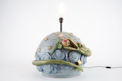 A French wood carving of a globe with snake and apple, 18th C., turned into lamp