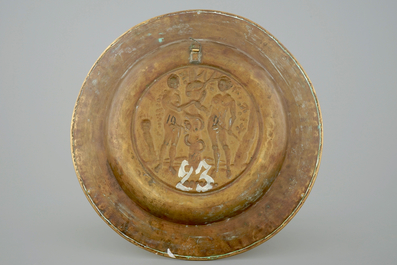 A good Nuremberg brass alms dish with Adam and Eve, 16th C.