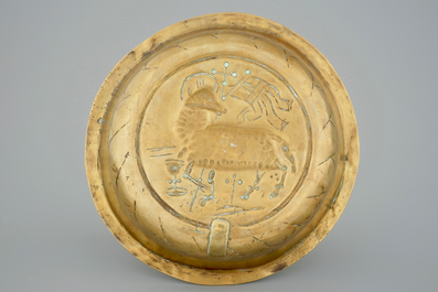 A Nuremberg brass alms bowl depicting the Agnus Dei, 15/16th C.