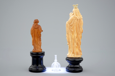 Two figures of Mary with child in ivory and boxwood, with a miniature glass bottle, 16/17th C.