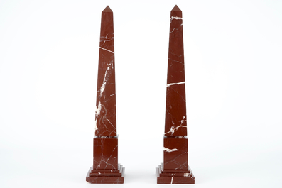 A pair of neo-classical red marble obelisks, 19/20th C.