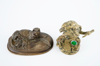 A group of bronze and regule animals: a group of cats, two hippos and a crane, 20th C.