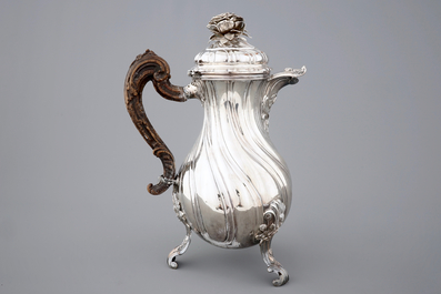 A Flemish silver armorial coffee pot of baluster shape, marked for Carel Benninck, Bruges, 1771