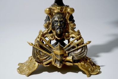 A glass-domed gilt spelter and brass garniture depicting Godfrey of Bouillon, early 20th C.
