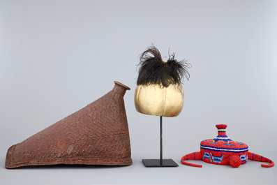 Two African hats and a Sudanese helmet, mid 20th C.