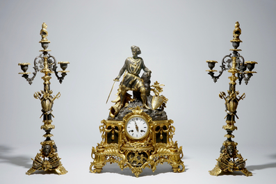 A glass-domed gilt spelter and brass garniture depicting Godfrey of Bouillon, early 20th C.
