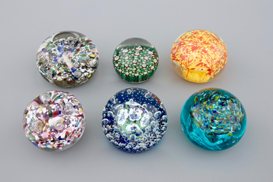 A set of six glass paperweights, 20th C.
