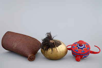 Two African hats and a Sudanese helmet, mid 20th C.