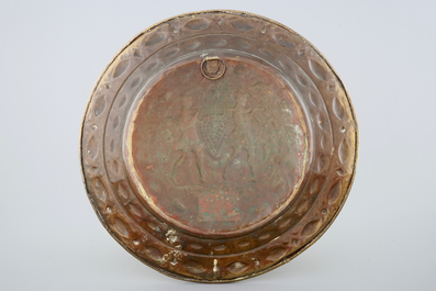 A large Flemish brass alms dish with the spies of Canaan, Malines, 17e eeuw