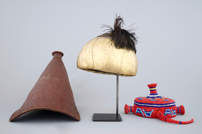 Two African hats and a Sudanese helmet, mid 20th C.