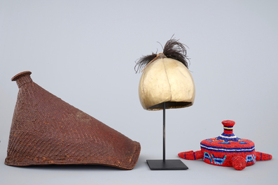 Two African hats and a Sudanese helmet, mid 20th C.