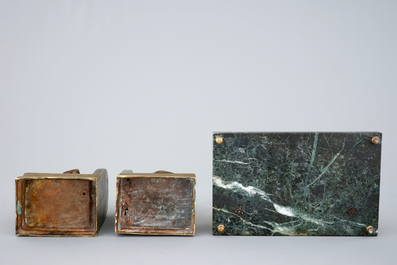 An art deco green marble inkwell and a pair of figurative book ends, 20th C.