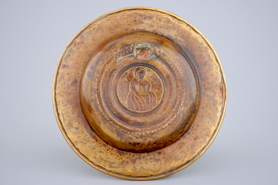 A small brass alms dish with a lady's portrait, Nuremberg, 17th C.