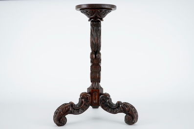 A wooden tea cabinet and a carved wood vase stand, 19/20th C.