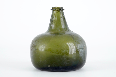 A Dutch green glass wine bottle, 17th C.