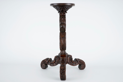 A wooden tea cabinet and a carved wood vase stand, 19/20th C.