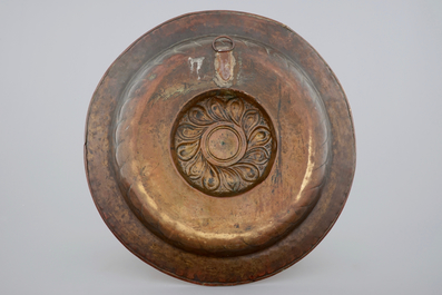 An exceptionally large brass alms dish with text medallion, 16th C., Nuremberg