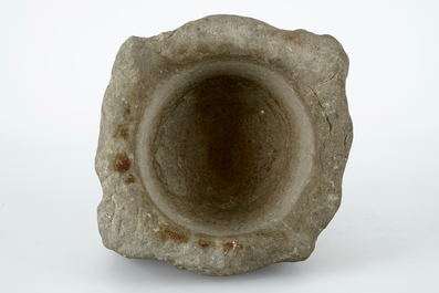 A large stone mortar, 13/14th C.