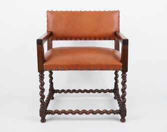 A 17th C. Italian carved wood chair and two later armchairs