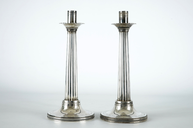 Two silver candle sticks, empire, France, 19th C.
