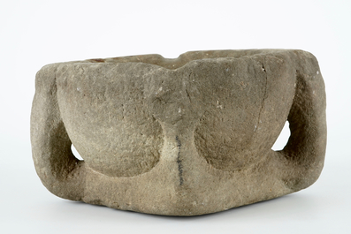 A large stone mortar, 13/14th C.