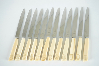 12 knives, a meat fork and knife with ivory handles, ca.1930, Congo, in box