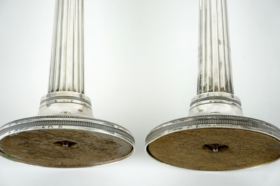 Two silver candle sticks, empire, France, 19th C.