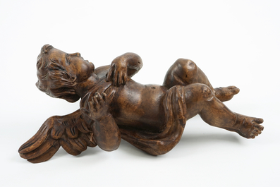 A patinated carved wood angel, 18/19th C.