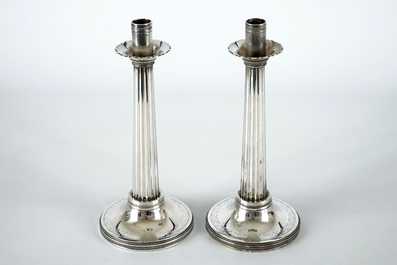 Two silver candle sticks, empire, France, 19th C.