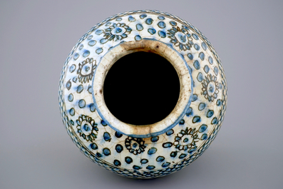 An Islamic fritware pottery vase of floral design, Syria or Iran, 18/19th C.