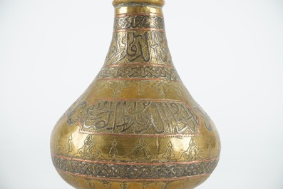 Two pairs of Cairoware brass vases and a smaller one, Egypte, 19th C.