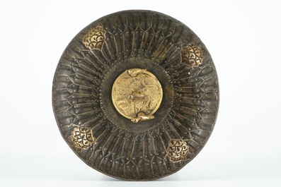 A flared gilt silver hamam bowl with 3 birds on a central medallion, 17/18th C.