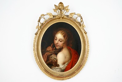 A portrait of a young lady with a kitten, oil on canvas in a gilt oval frame, 19th C.