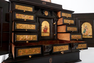 A Flemish ebony cabinet with gilt-ground painting, Antwerp, 17th C.