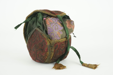 A Tibetan human skull drum, damaru, in original case, Tibet, 18/19th C.