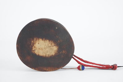 A Tibetan human skull drum, damaru, in original case, Tibet, 18/19th C.