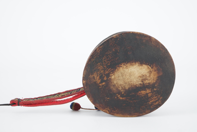 A Tibetan human skull drum, damaru, in original case, Tibet, 18/19th C.