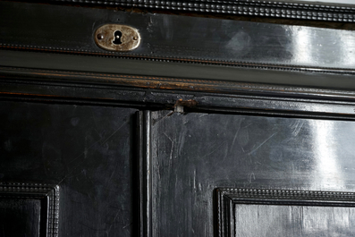 A Flemish ebony cabinet with gilt-ground painting, Antwerp, 17th C.