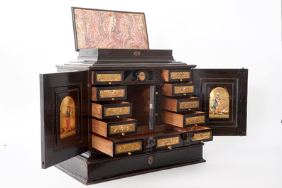 A Flemish ebony cabinet with gilt-ground painting, Antwerp, 17th C.