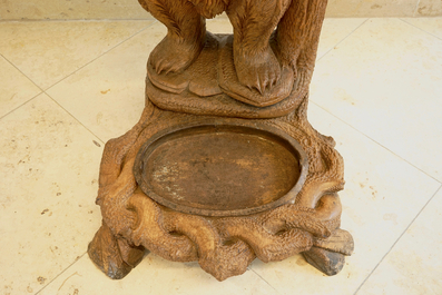 A carved wood coat and umbrella hall rack with two bears on a tree, Black Forest, 1st half 20th C.