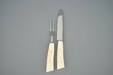 12 couteaux, une fourche et un couteau &agrave; viande, les manches en ivoire de Congo vers 1930