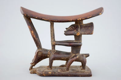 An African carved wood headrest pillow, 20th C.