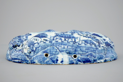 An unusual blue and white Chinese porcelain walnut-shaped hanging ornament or lid, 18th C.