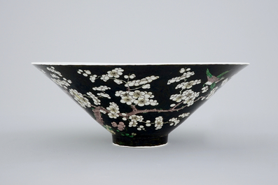 An unusual conical Chinese famille noire bowl, 19th C.
