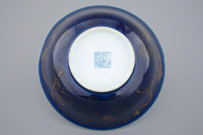 A Chinese powder blue and gilt dragon bowl, 18/19th C.